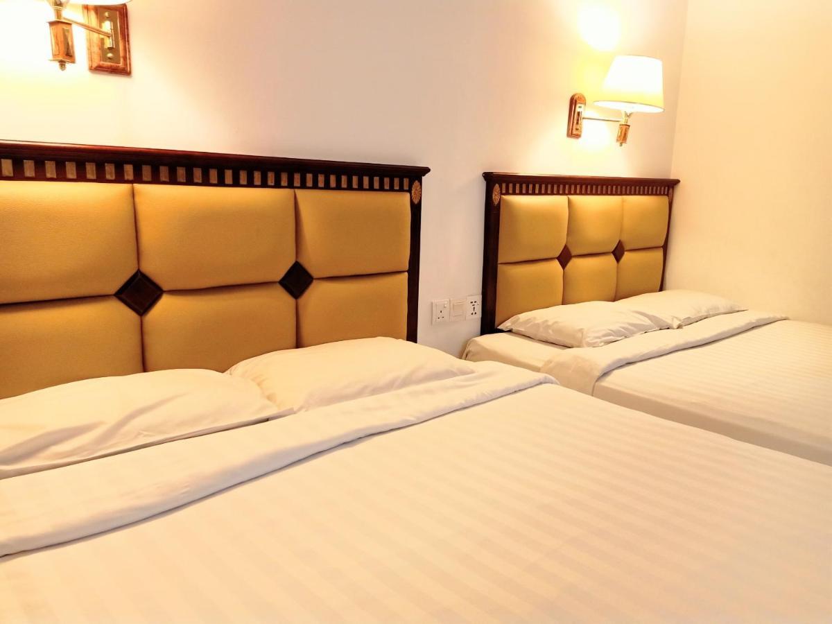 Super Oyo 90464 Borneo Suites Hotel Kota Kinabalu Exterior foto